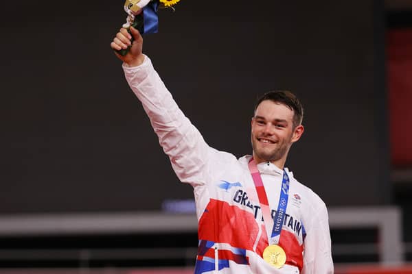 Gold medalist Matthew Walls of Team Great Britain, poses on the podium during the medal ceremony after the Men's Omnium final of the track cycling (Photo by Tim de Waele/Getty Images)