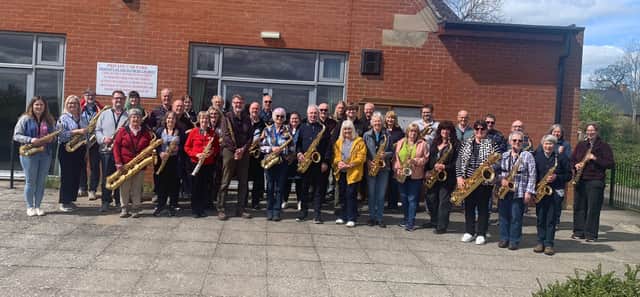 Saxophone workshop attendees with (centre) Andy Tweed and Karen Street
