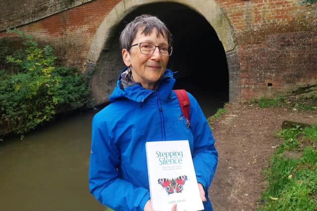 Judith by the canal tunnel that inspired a chapter in her memoir, Stepping out of Silence