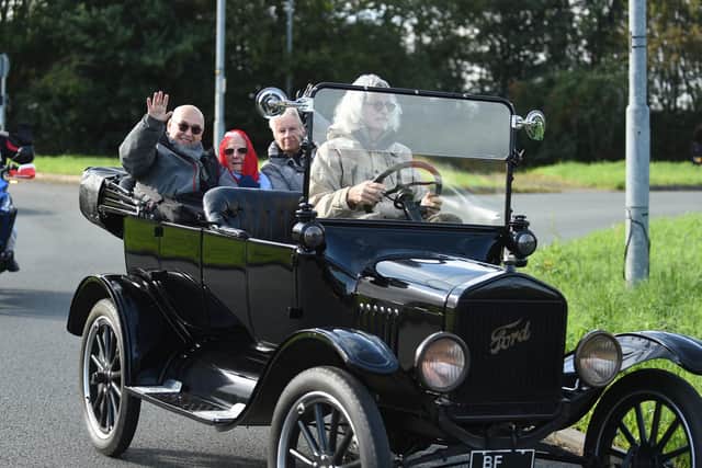 Centre, Innocent Stretton aged 100 is driven to the Langton Inn to celebrate her birthday with her family.