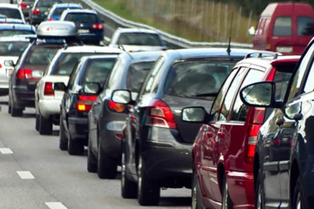 Top county councillors have promised to strive to cut traffic congestion and slash pollution in Market Harborough.