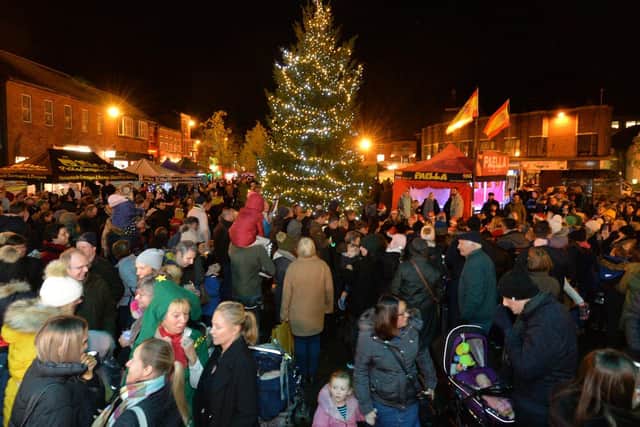 Busy scenes on the Square during the Christmas Tree lights switch on.
PICTURE: ANDREW CARPENTER