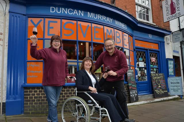 Support...Duncan Murray and Megan Murray of Duncan Murray Wines raised 444 from their Winter Wine Tasting event and presented it to Amanda Ball scheme coordinator at Shopmobility to purchase a self propelled wheelchair with leg risers.
PICTURE: ANDREW CARPENTER