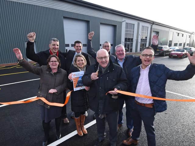 Airfield Business Park ribbin cutting...front, second from left, Andrea Hopkins Leicestershire County Council principal valuer, Byron Rhodes Deputy Leader of Leicestershire County Council and Jim Hardie of J Tomlinson integrated building solutions.
PICTURE: ANDREW CARPENTER