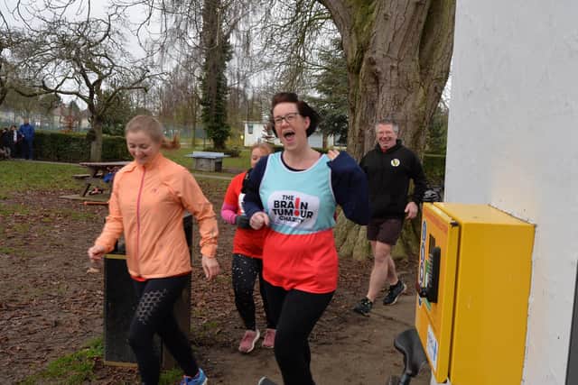 This is the moment Catherine Searcy arrived at Welland Park and was greeted by 100 runners for her last mile.