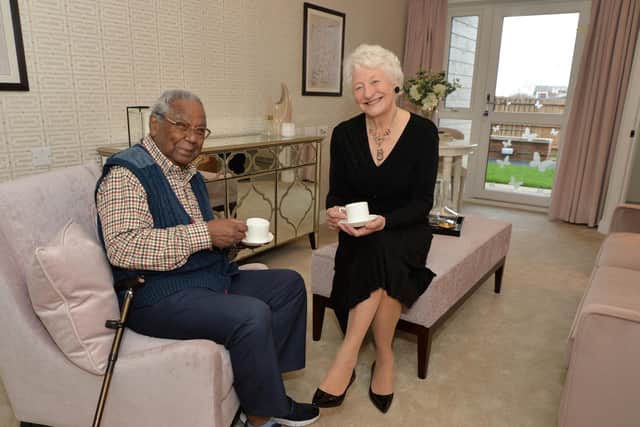 Mary Peters with resident Dennis White at Elizabeth Place.
PICTURE: ANDREW CARPENTER