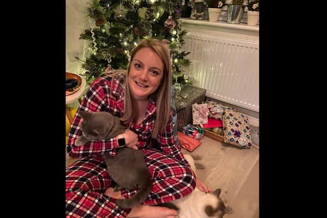 Charlotte Skelton with cats David Bowie and Sergeant Pepper.