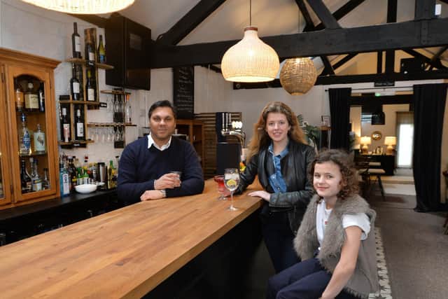 Vick Sherma of restaurant Fifty Eight with daughters Georgia 10 and Helena 14 on St Mary's Road in Market Harborough.
PICTURE: ANDREW CARPENTER