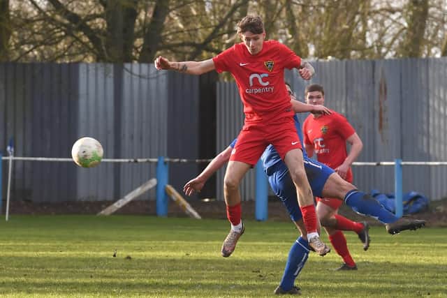 Boston Town (blue) v Harborough (red) football action and file pics. Daniel Forbes (red)