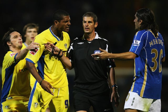 Jermaine Beckford argues with Pompey's Pedro Mendes during the Carling Cup second round clash at Fratton Park in August 2007.