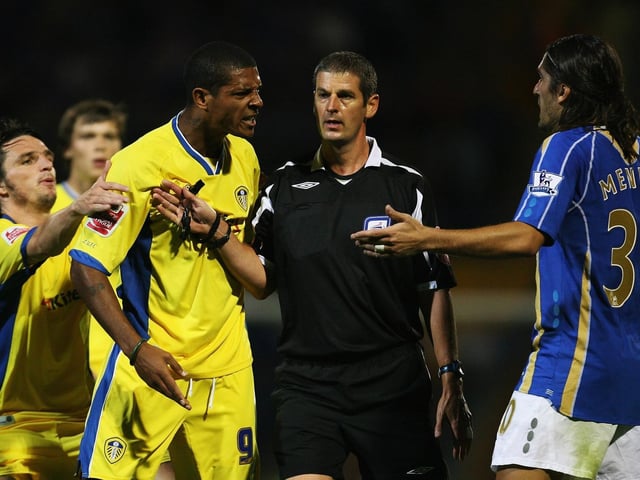 Jermaine Beckford argues with Pompey's Pedro Mendes during the Carling Cup second round clash at Fratton Park in August 2007.