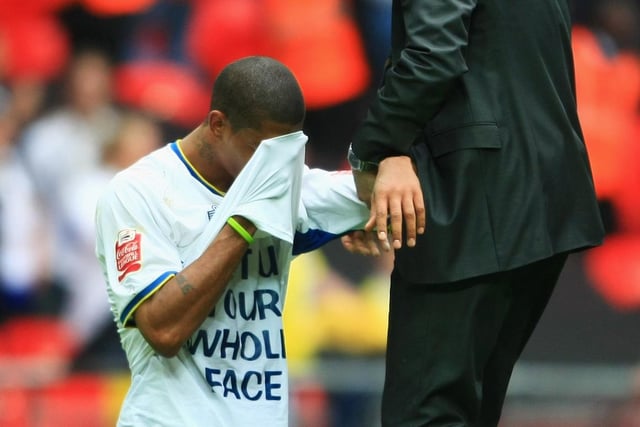 Leeds United manager Gary McAllister consoles a devastated Jermaine Beckford following the Coca Cola League 1 play-off final against Doncaster Rovers at Wembley in May 2008.