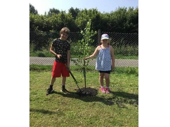 Excited schoolchildren in Lubenham have planted a special tree gifted to them by a neighbouring village school.