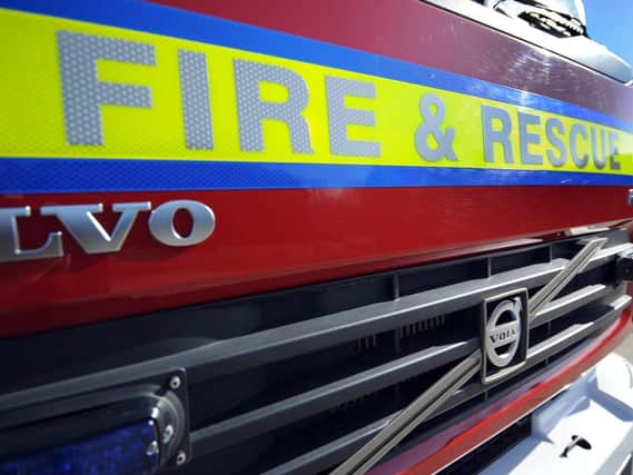 Firefighters carried out a long highly-complex operation to rescue a terrified dog trapped under a barn on the edge of Harborough early today (Wednesday).