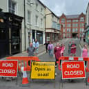 Road closed...shop keepers on Adam & Eve Street want road reopened.
PICTURE: ANDREW CARPENTER