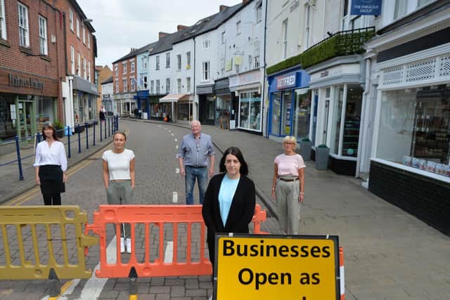 Road closure...Front, Amber Lucas of Gardners Cakery with Sara Storey of Cookshop, Emma Steed of Natures Pantry, Martin Dean of Lascelles and Jan Johnston of Jacks on Church Street.
PICTURE: ANDREW CARPENTER