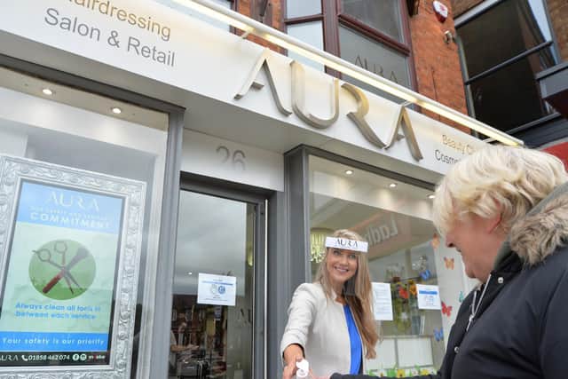 Customers greeted at Aura.
PICTURE: ANDREW CARPENTER