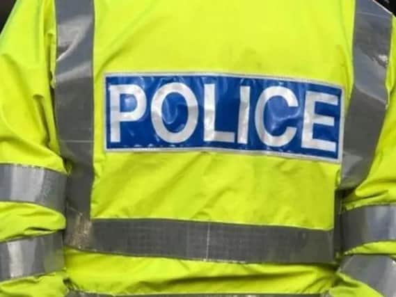 Five police vehicles were called to a house in Desborough on Sunday night after four people climbed on to the roof.