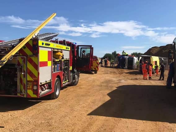 An injured driver was dramatically rescued this morning (Tuesday) after his tipper lorry turned over as he tipped sand at a quarry in Husbands Bosworth.