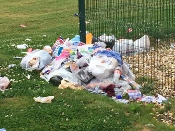 An exhaustive clean-up is being carried out by expert contractors on a site that's been occupied by travellers in Market Harborough.