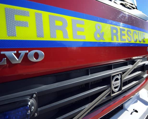 Two women rescued by firefighters had to be treated at hospital after breathing in thick smoke after the fire was triggered by an electrical fault.