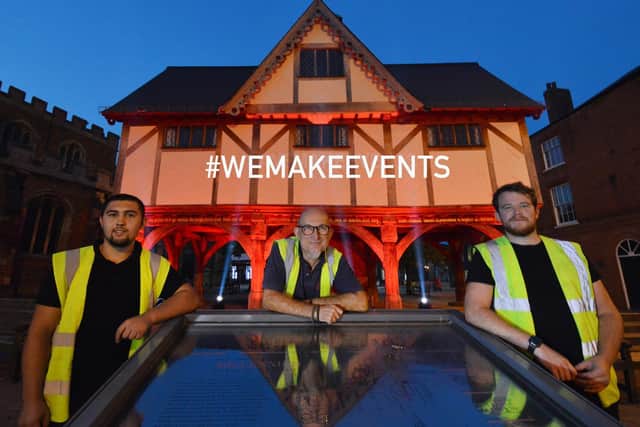 The Old Grammar School was bathed in red light during Tuesday evening for the 'light it red' campaign to help the plight of all the freelance workers in the entertainment industry as part of a nationwide protest and petition. Pictured left to right, Conor Robb, Neil Stout and Matt Compton.
PICTURE: ANDREW CARPENTER