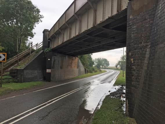 The flooded road at the railway bridge on the A6 Harborough Road in Kibworth. PICTURE: ANDREW CARPENTER