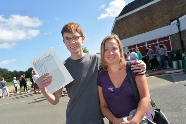 Proud...Ben Bransby 15 celebrates with mum Madie during GCSE results at Welland Park Academy.
PICTURE: ANDREW CARPENTER