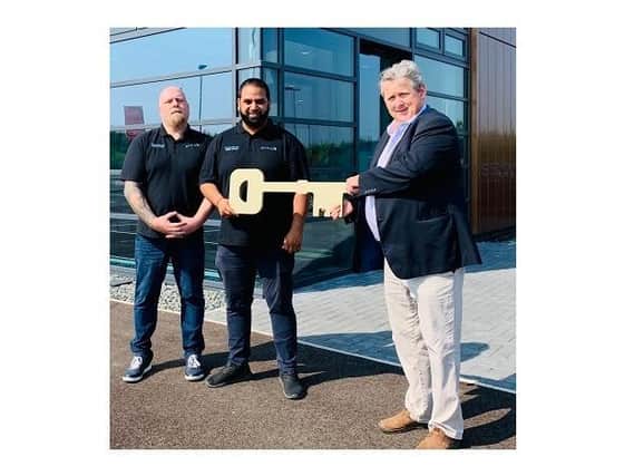Darren Shaw, sales manager at Krypton IT Solutions, Anish Bharakhda, lead technician at Krypton IT Solutions, and Cllr Phil King, leader of Harborough District Council.