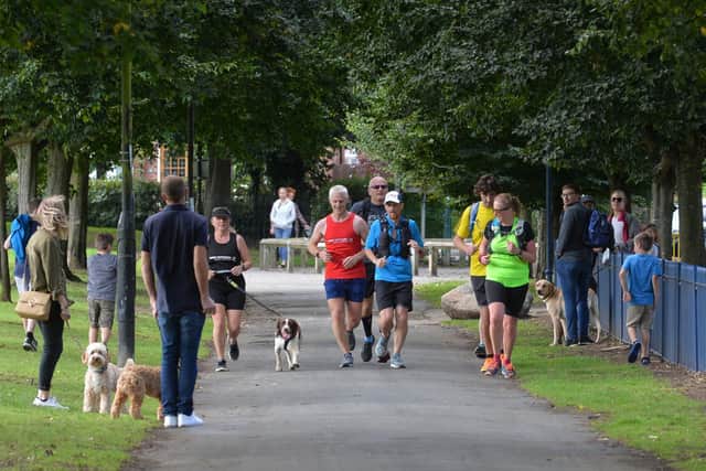 Market Harborough social runners heading to the finish line in Welland Park during their marathon relay on Saturday.
PICTURE: ANDREW CARPENTER