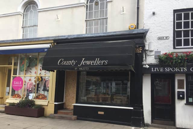 The ram raiders smashed the front door of County Jewellers with a motorbike.