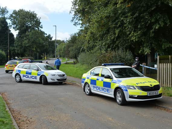 Police at Kibworth tennis club on Smeeton Road where a man's body was found. PICTURE: ANDREW CARPENTER