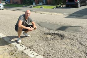 Craig Hartwell is still recovering after he accidentally rolled his kids petrol quad bike on top of him in the two-foot wide pothole just feet from his home in Limner Street.