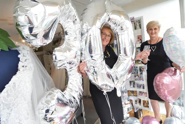 Debbie Taylor and Jeanette Reid of Wedding Belles dress shop celebate its 30th Anniversary in Kibworth.
PICTURE: ANDREW CARPENTER