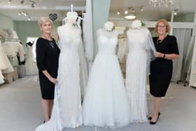 Jeanette Reid and Debbie Taylor inside Wedding Belles dress shop celebate its 30th Anniversary in Kibworth.
PICTURE: ANDREW CARPENTER