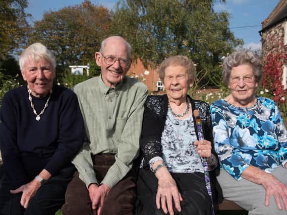 Evelyn with her brother Bernard (second left), his wife Janice, and her sister Marjorie (far right).