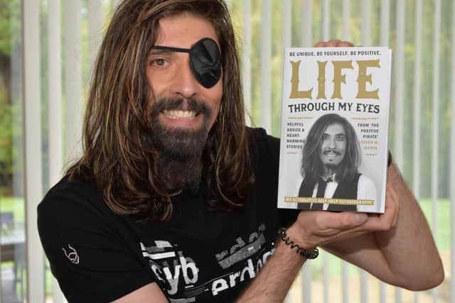 Steve Rippin with his new book 'Life Through My Eyes'.
PICTURE: ANDREW CARPENTER