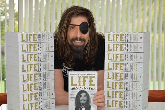 Steve Rippin with his new book 'Life Through My Eyes'.
PICTURE: ANDREW CARPENTER