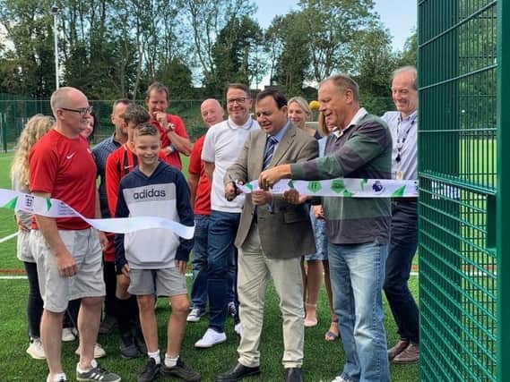 Alberto is pictured before the pandemic at the formal opening of the new all-weather sports pitch at Saffron Dynamo FC in Cosby.