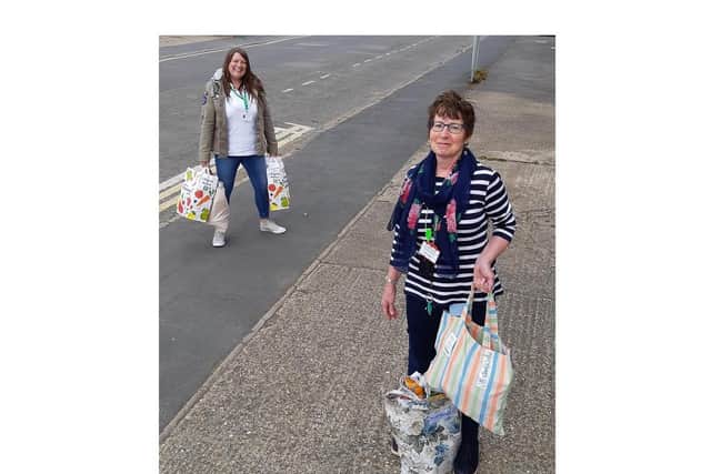 Food bank workers Danielle Robinson and Jane Thomas.