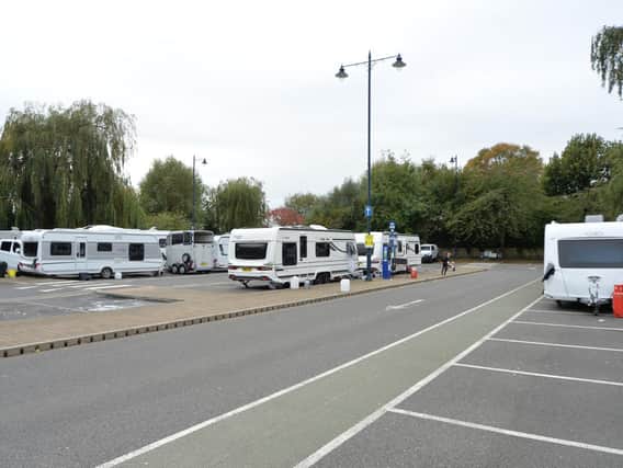 Travellers who pitched up in a busy shoppers’ car park in Market Harborough town centre have moved out.