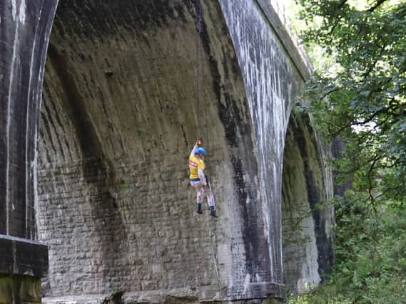 Jen Parker conquered her crippling fear of heights to abseil down an 80ft bridge in memory of her beloved mum.