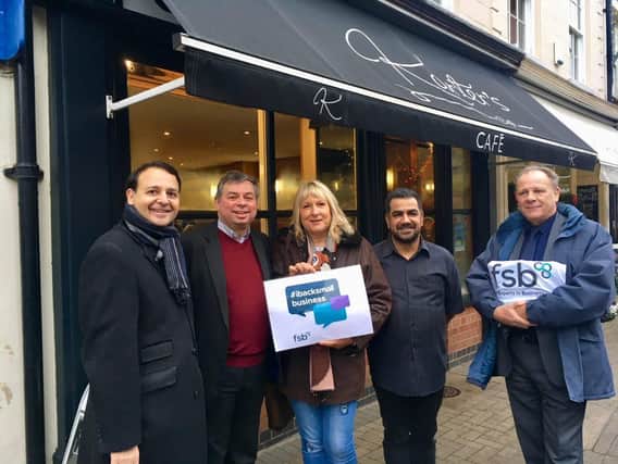MP Alberto Costa pictured with local Harborough district councillors and Danny Gill, owner of Karters Caf in Lutterworth.