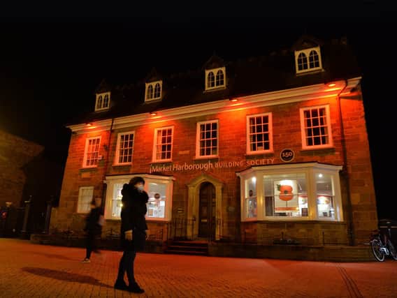 Market Harborough Building Socity Welland House on the Square is lit red to support this year's poppy appeal.
PICTURE: ANDREW CARPENTER