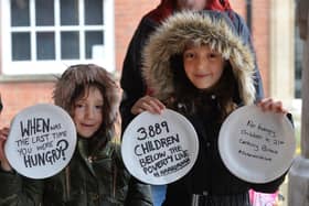 Violet Woodiwiss 7 and Willow Woodiwiss 9 during the free school meals demonstration under the Old Grammar School on Saturday.
PICTURE: ANDREW CARPENTER