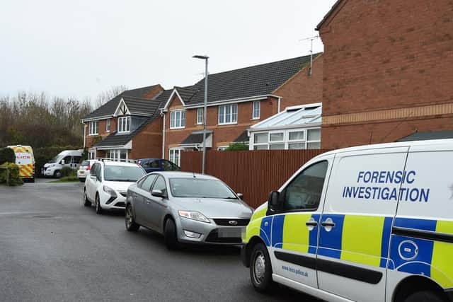 Police at the house on Shelland Close in Market Harborough.
PICTURE: ANDREW CARPENTER