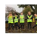 A group of pupils at Ridgeway Primary Academy with their high-vis vests donated by David Wilson Homes.