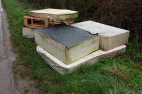 Two mattresses, three bed bases and a wooden frame were piled up on the grass verge inches from the road about midway between East Farndon and Lubenham.