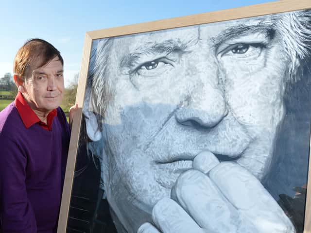 Mike Rickman with a portrait of his late brother Alan Rickman whose diaries will be published in a book.
PICTURE: ANDREW CARPENTER