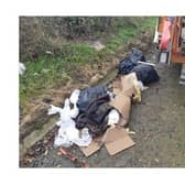 The offender was spotted piling up household waste on the A47 in Tugby, in the north of Harborough district.